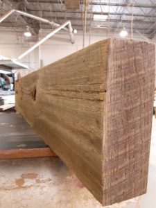 Brown reclaimed wood floating shelf
